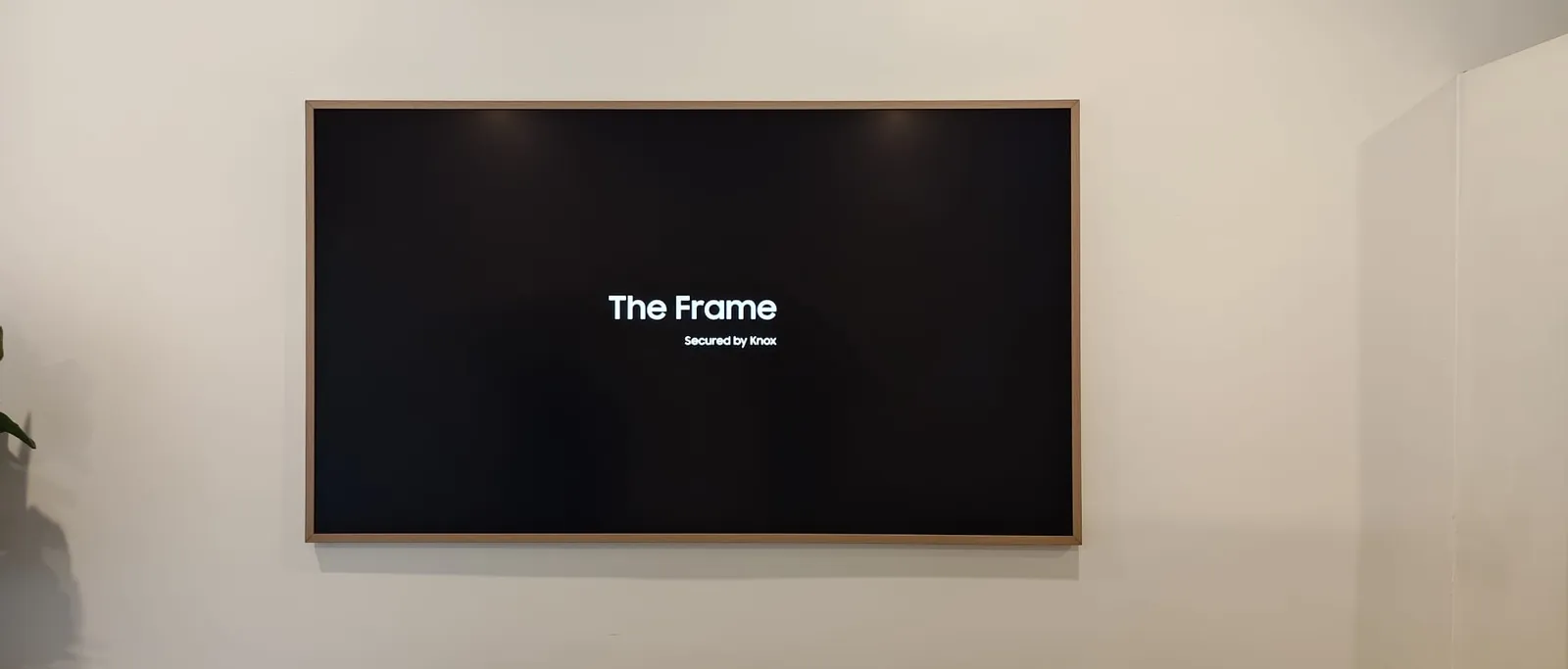 Samsung Frame TV mounted in a timber bezel