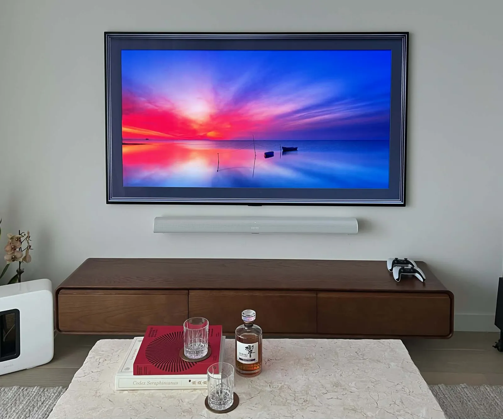 Samsung Frame TV and soundbar mounted flush in living room